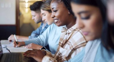 Black woman, education and student with university, study with laptop and research for project in c.