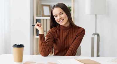 exam study preparation learning desk white student caucasian sitting room table teenager education freelancer notebook schoolgirl laptop computer home girl