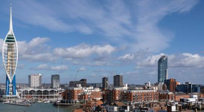 The harbor area and Spinnaker Tower in the city of Portsmouth on the south coast of England in the United Kingdom.